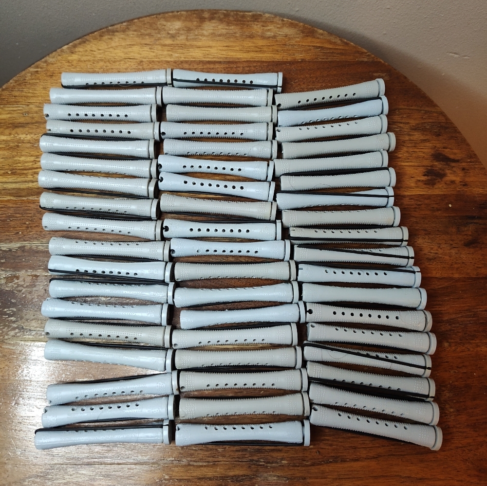 54 Used Gray Perm Rods With a 12 Pack Of New Rods